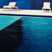 Pool with Two White Chairs